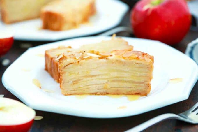 frontal shot invisible apple cake slice on a plate