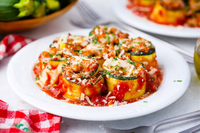 Homemade zucchini lasagna rollups on a plate.
