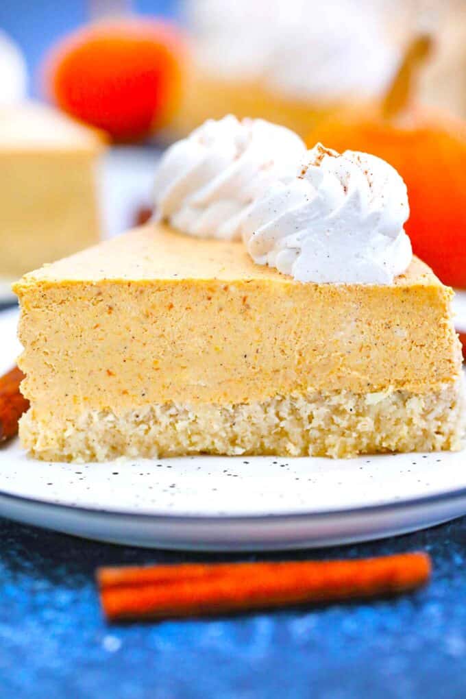 close shot of a slice of low carb keto pumpkin cheesecake
