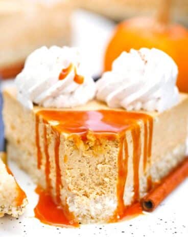 close shot of low carb pumpkin cheesecake with caramel dripping