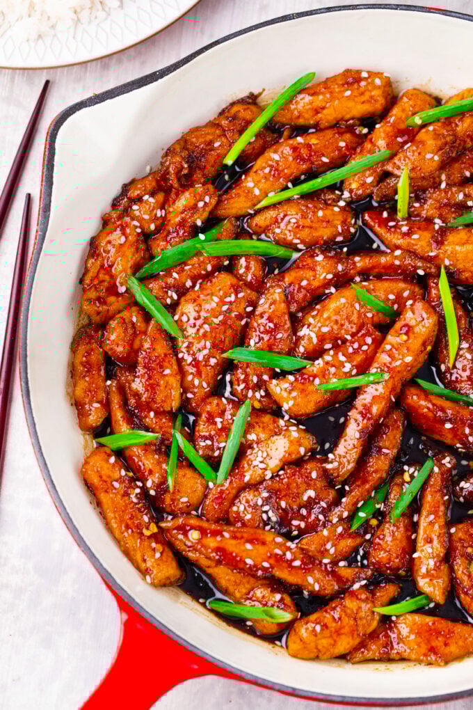Overhead shot of a Mongolian chicken in a skillet.