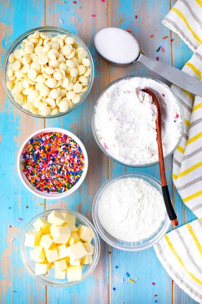 no bake cake batter truffles ingredients in bowls on a table