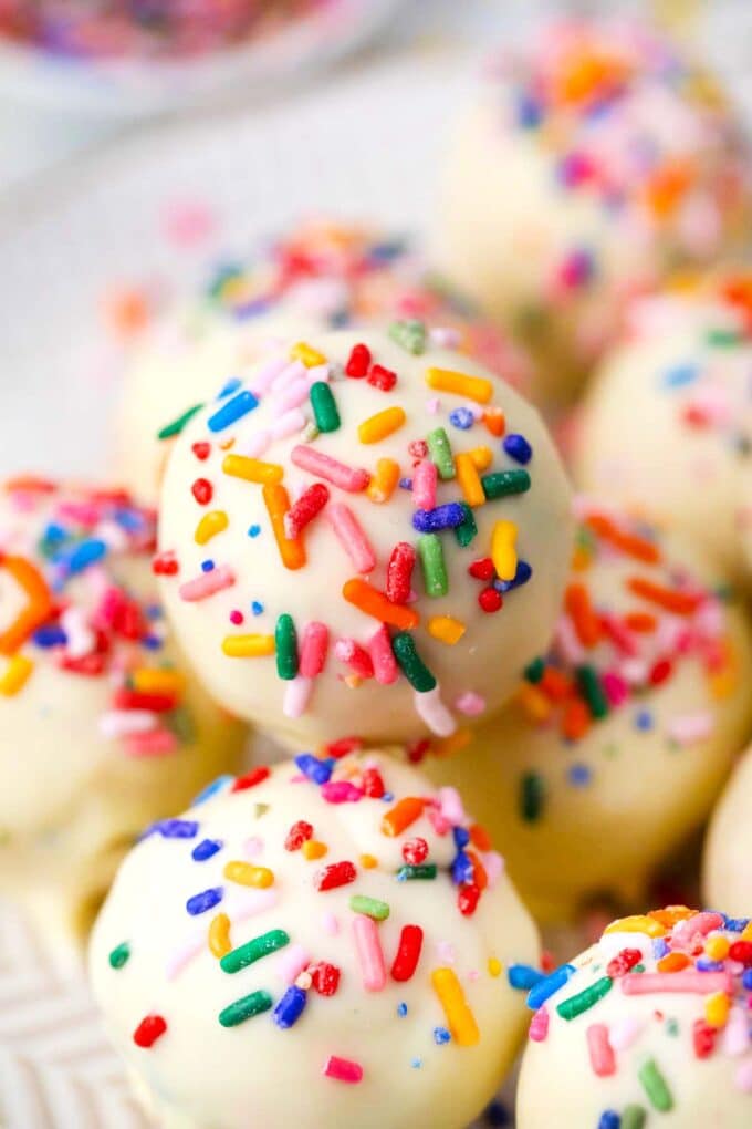 no bake cake batter truffles topped with rainbow sprinkles