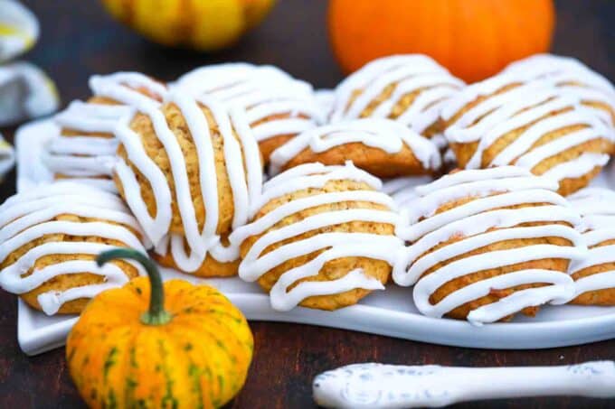 a plate of maple glazed pumpkin oatmeal cookies
