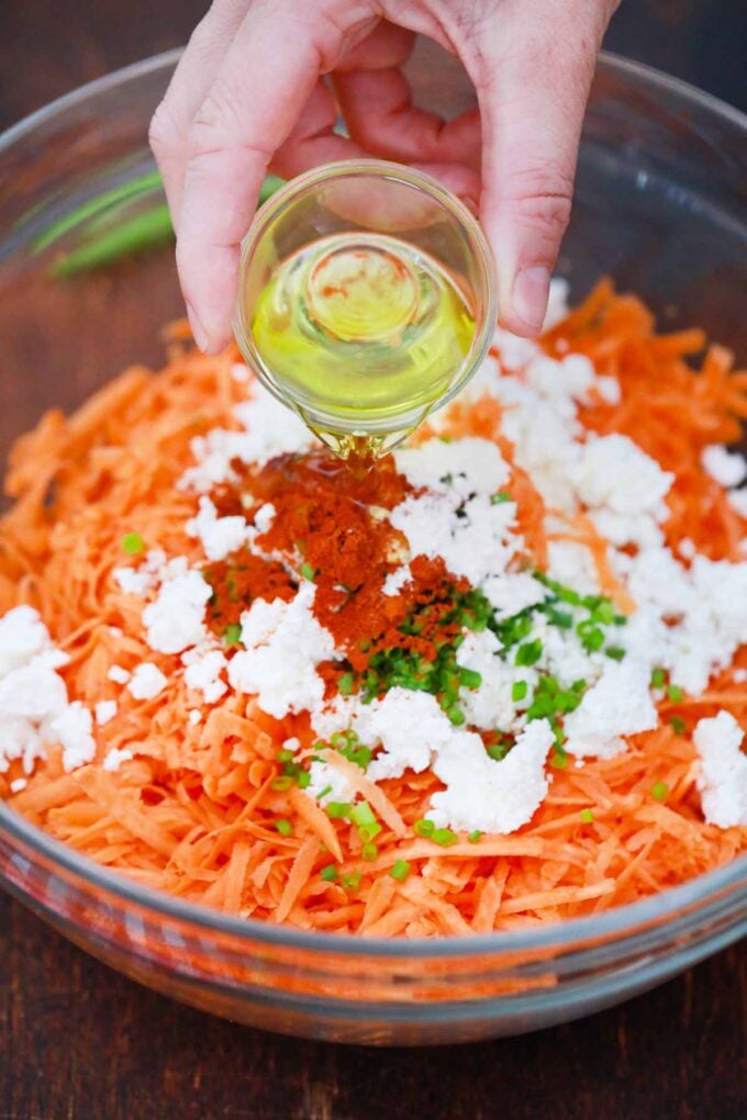 Sweet potato fritters ingredients mixed in a bowl.