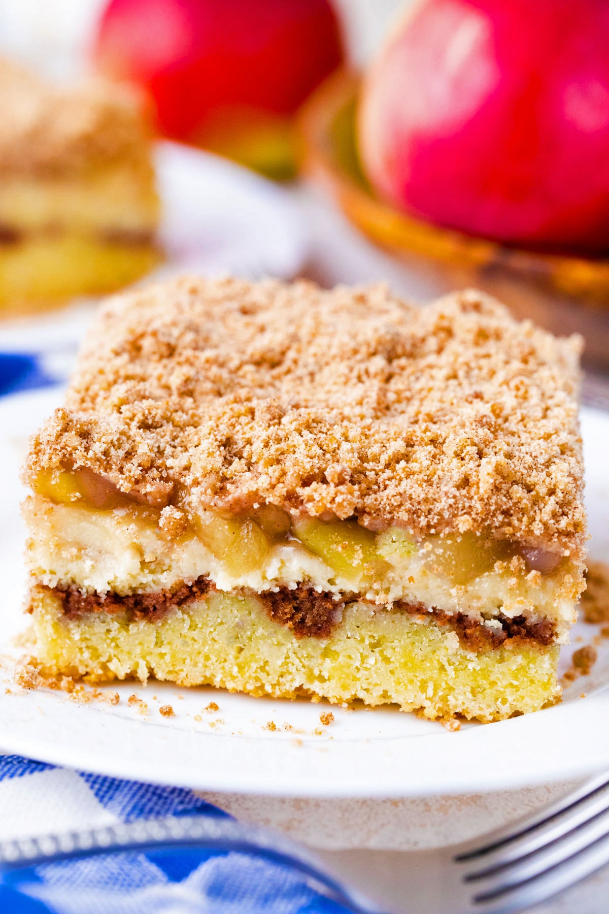 Homemade apple pie coffee cake topped with cinnamon streusel.