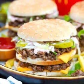 big mac sloppy joes on a plate with fried in the background