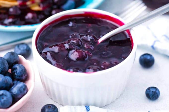 a ramkin with homemade blueberry sauce