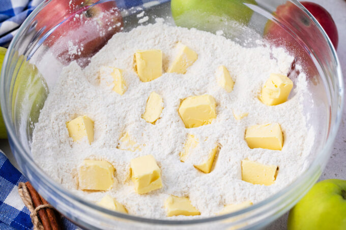 Mixing butter and flour.