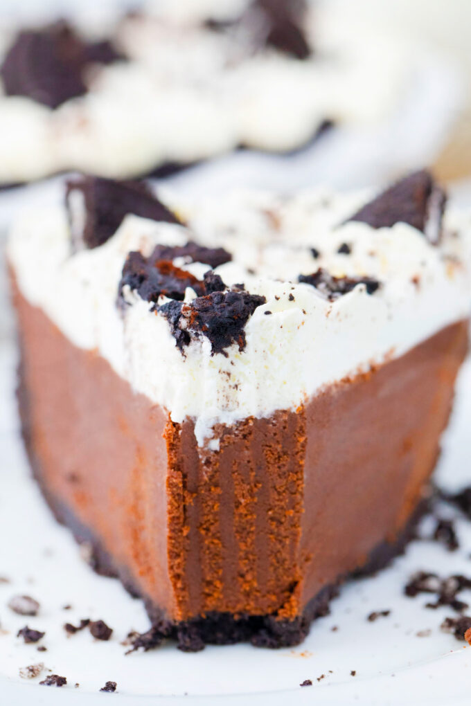 Frontal shot of a slice of homemade no bake chocolate pie.