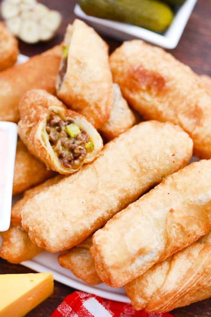 Crispy cheeseburger egg rolls with a juicy meat filling.