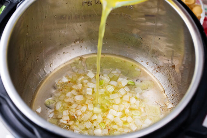 Deglaze the Instant Pot with chicken broth.