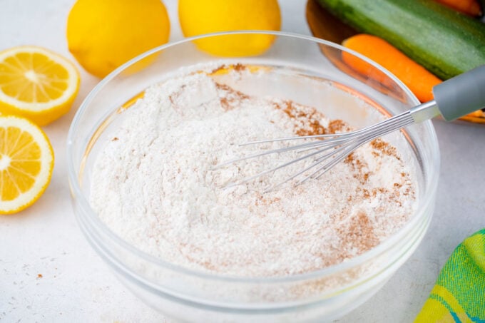 Whisking dry ingredients for carrot zucchini bread.