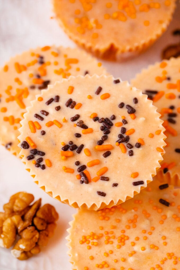 Pumpkin fudge topped with orange and black sprinkles.