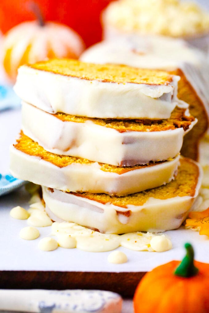 A stack of glazed pumpkin pound cake.