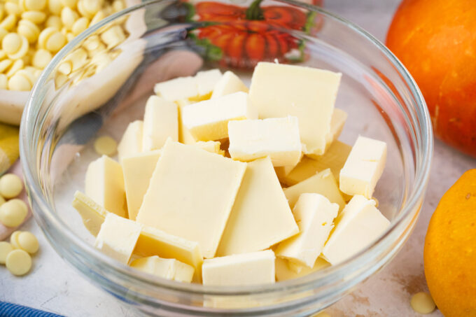 Chopped white chocolate in a bowl.