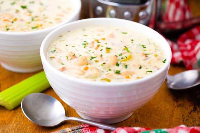 two bowls of slow cooker ham and bean soup