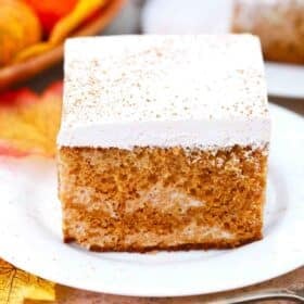 a slice of tres leches pumpkin cake