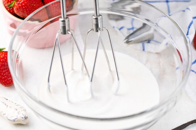 Whipping heavy cream.