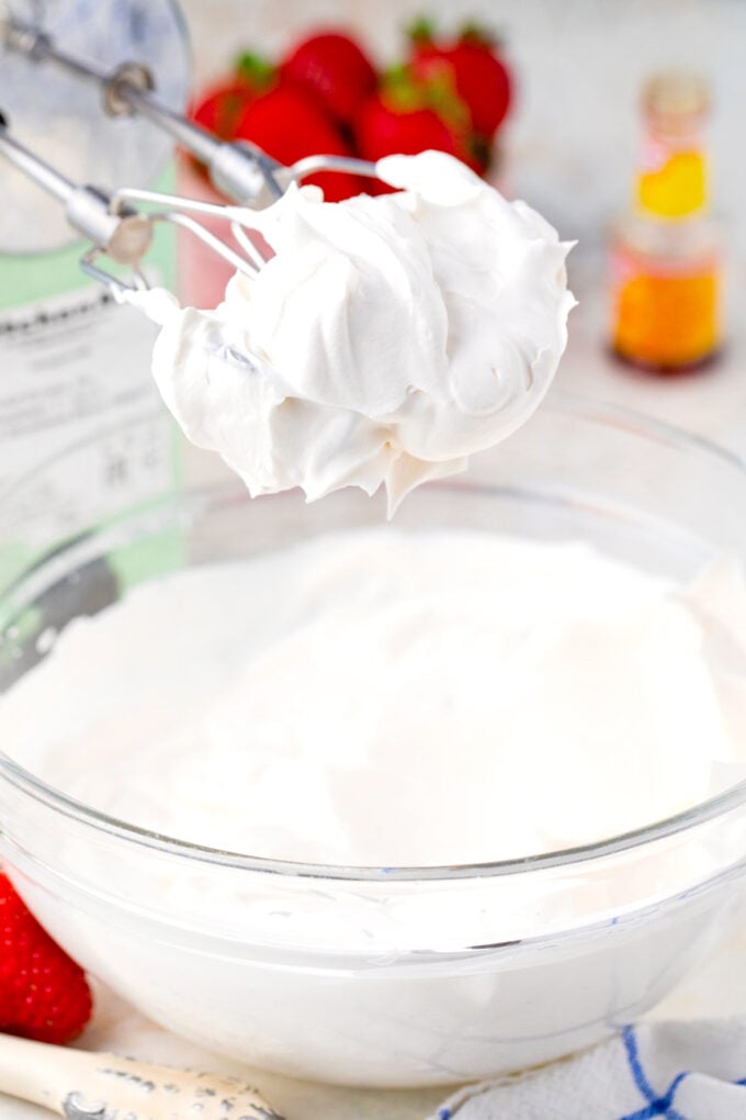 Homemade whipped cream on beaters.