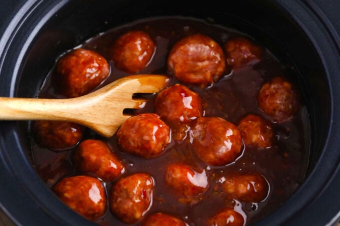Overhead shot of BBQ crockpot meatballs in the slow cooker.