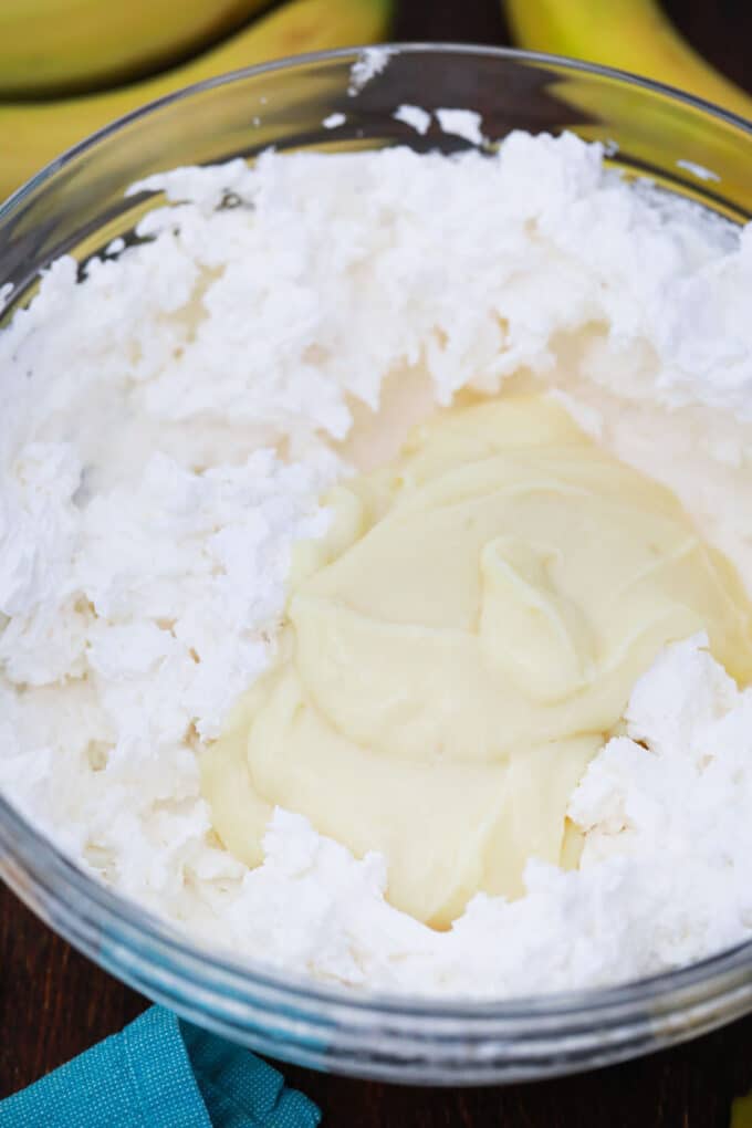Combine vanilla pudding and whipped cream.