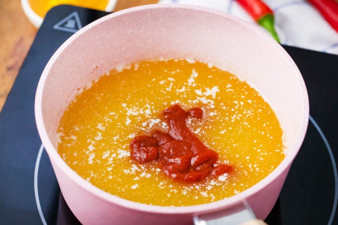 Buffalo sauce ingredients in a saucepan.