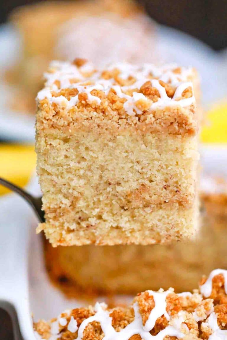 a slice of banana crumb cake on a serving spatula