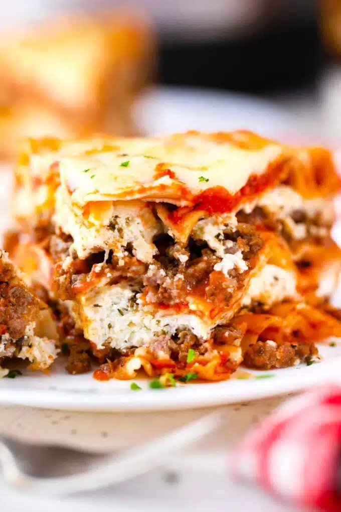 close shot of instant pot lasagna revealing the beef and cheese layers