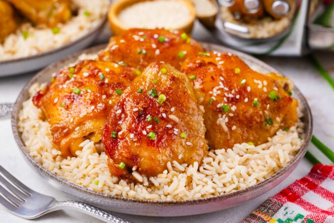 Juicy slow cooker brown sugar garlic chicken served with rice.