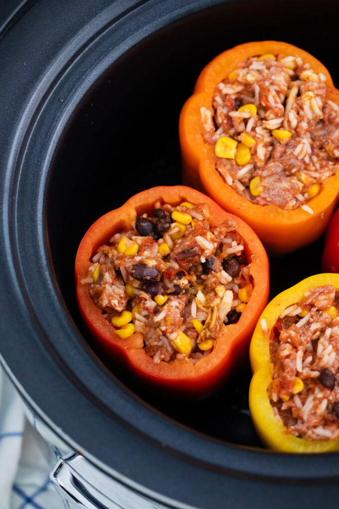 Slow cooking Mexican stuffed peppers.