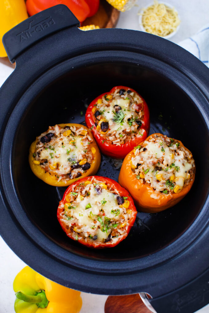 Overhead shot of Mexican stuffed peppers in the slow cooker.