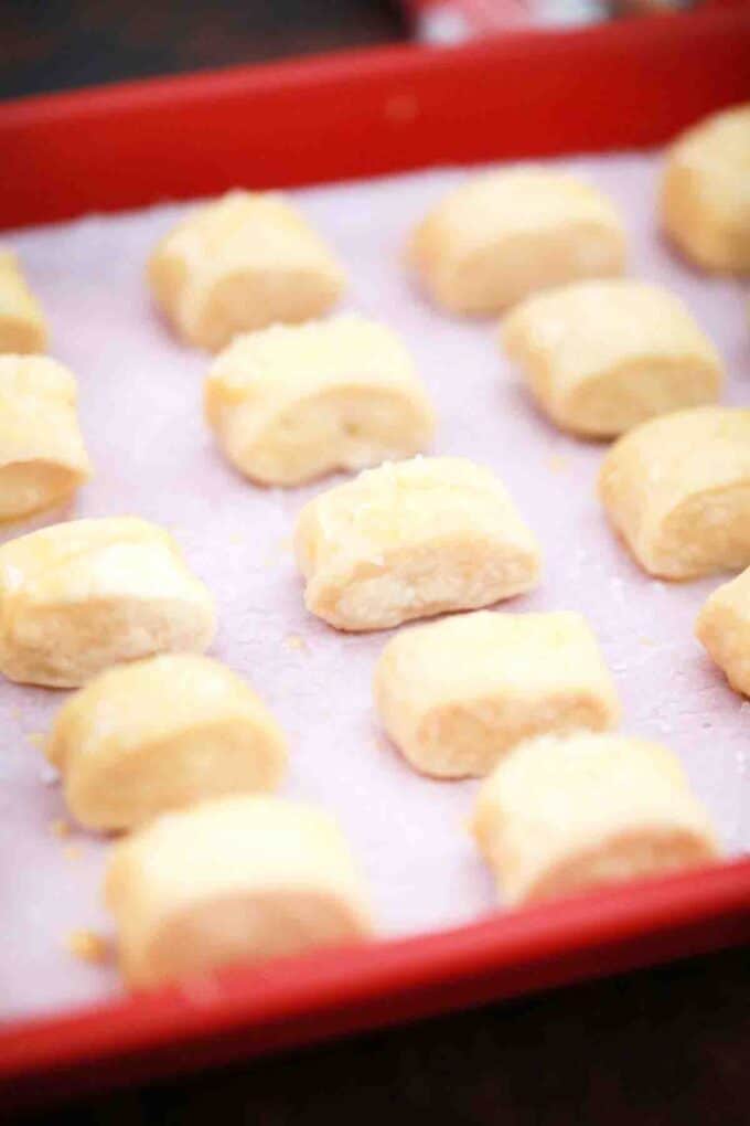 raw pretzel bites on a baking sheet