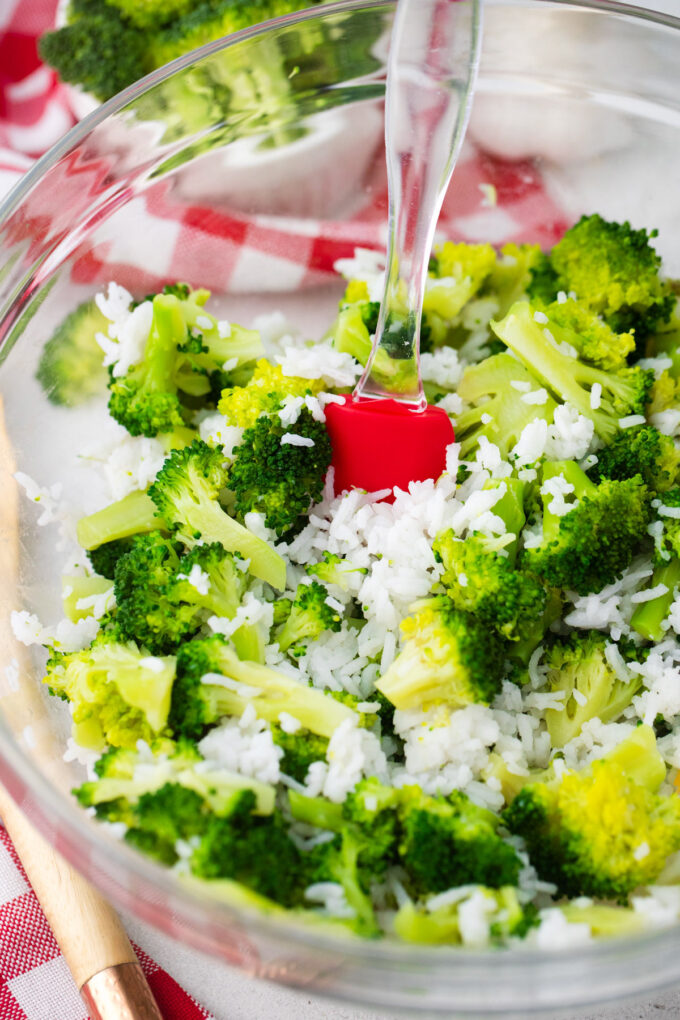 Broccoli and rice mixed in a bowl.