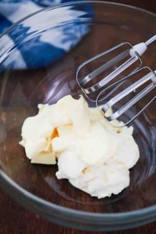 beating cream cheese and butter in a bowl