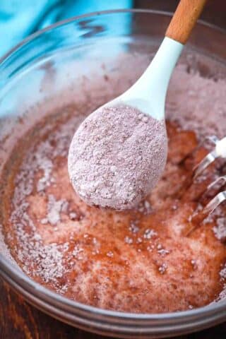 adding flour mixture to wet ingredients
