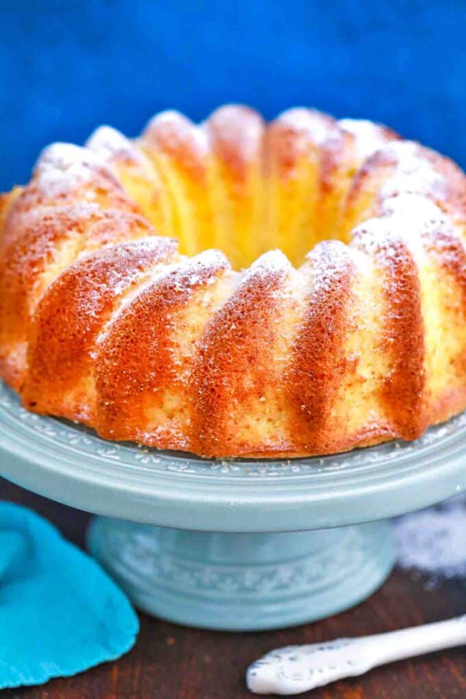 cream cheese pound cake on a cake stand