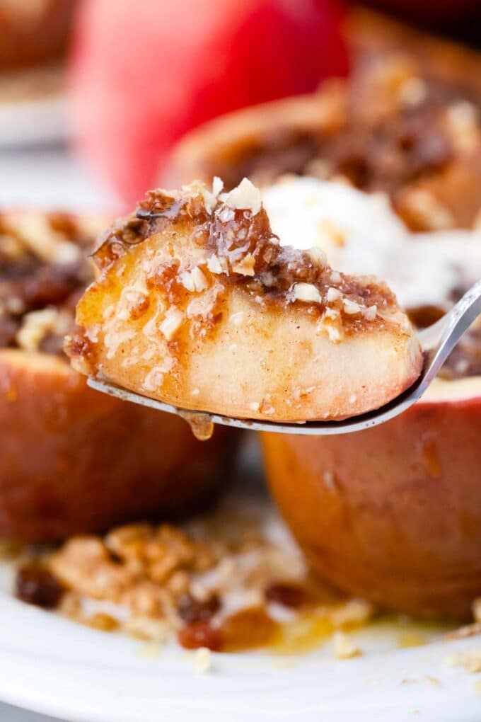 a forkful of tender and sweet crockpot baked apples