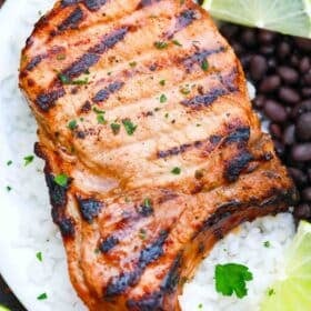 cuban mojo pork chops served with black beans and rice