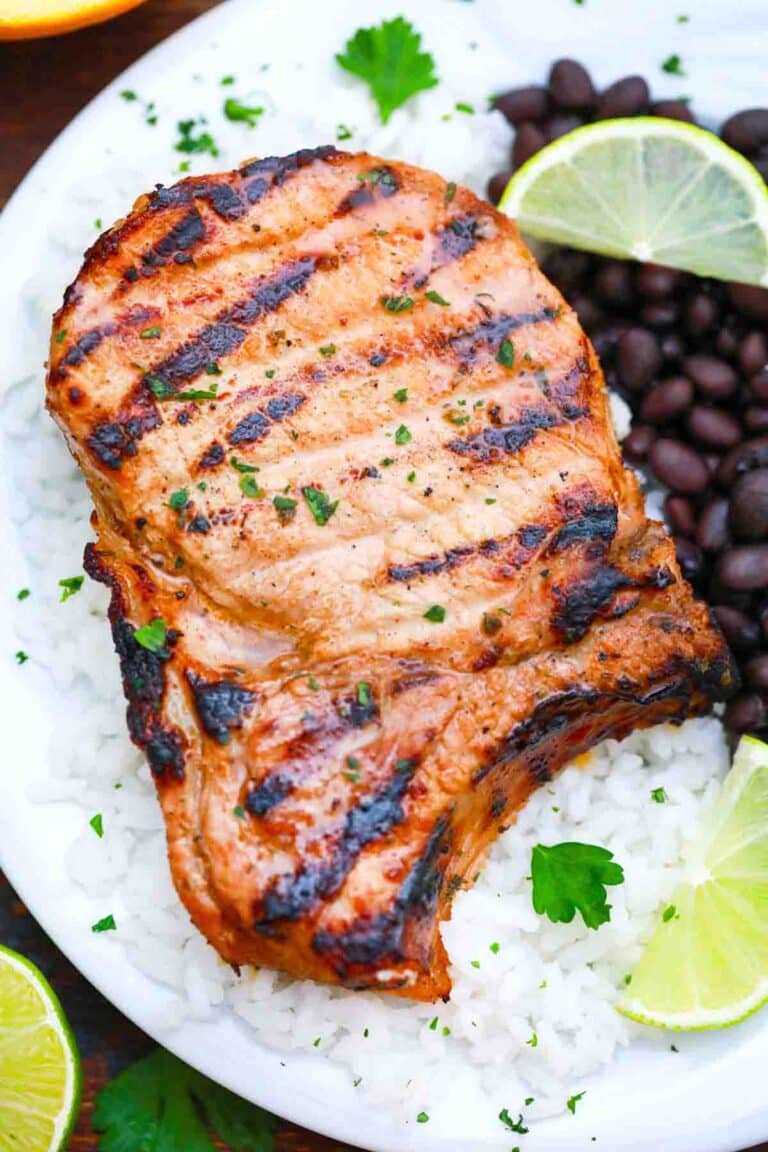 cuban mojo pork chops served with black beans and rice