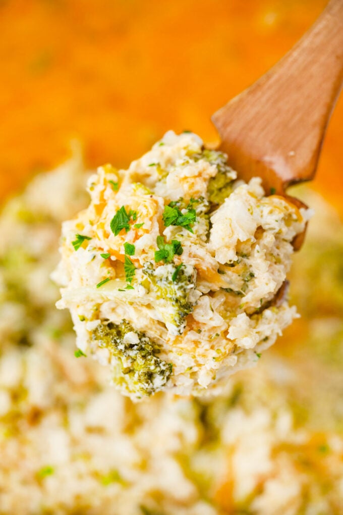 A spoonful of creamy and cheesy broccoli rice casserole.