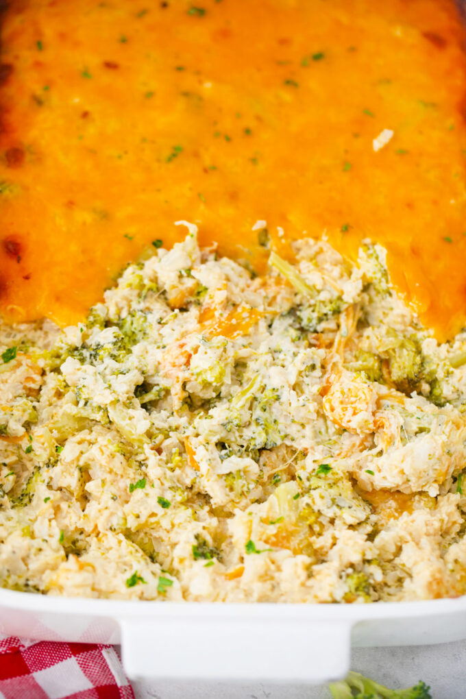 Broccoli rice casserole topped with a cheesy layer.