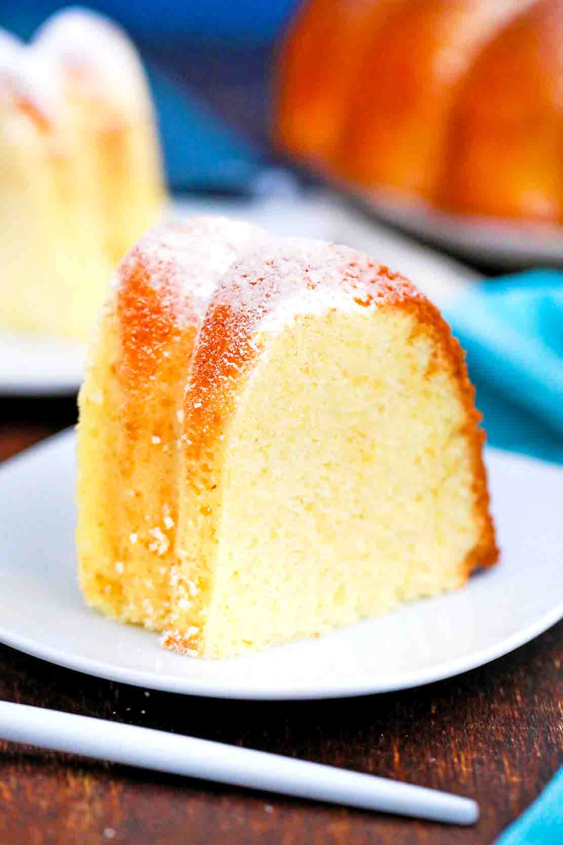 a slice of cream cheese pound cake on a plate