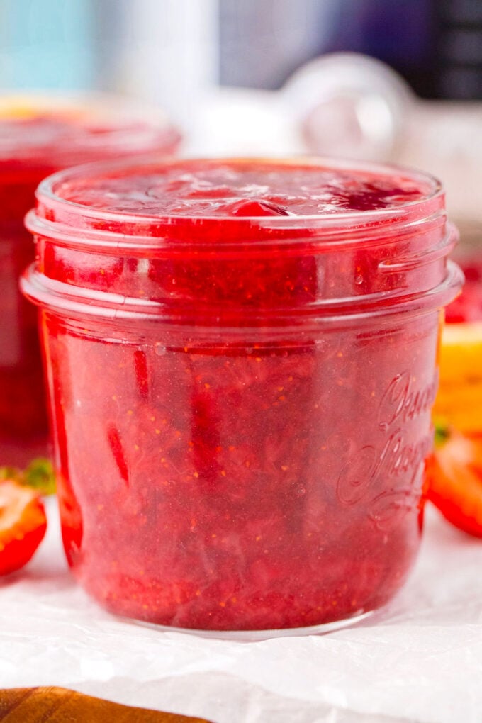 A jar of homemade instant pot strawberry jam.