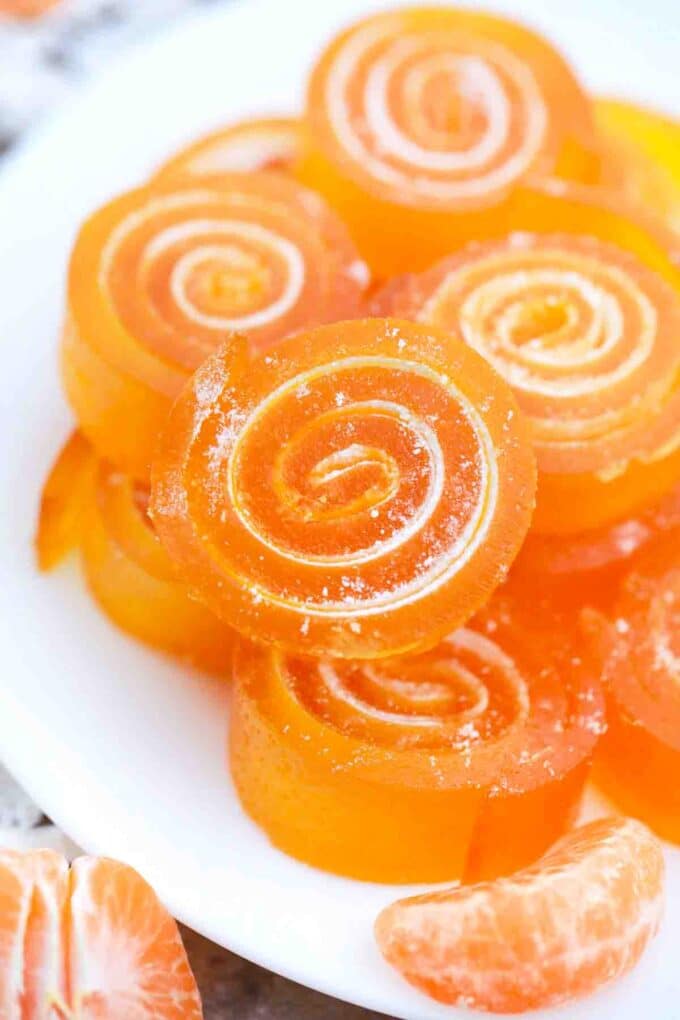 slices of orange jelly candy on a plate