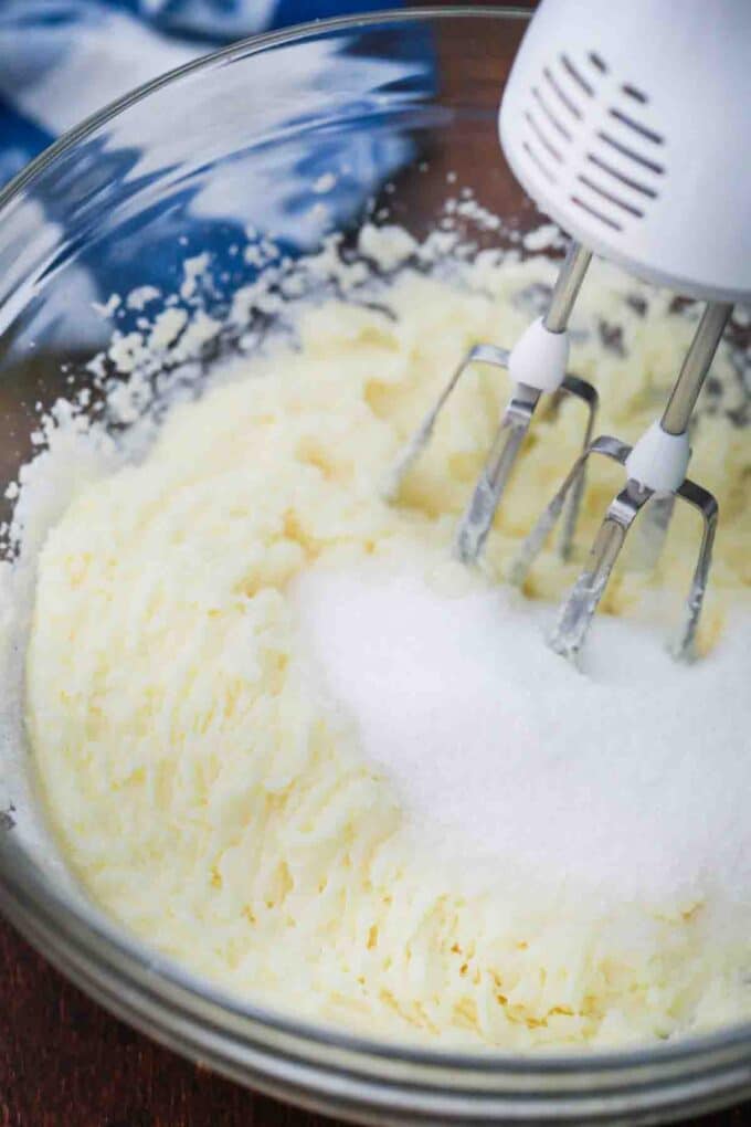 adding sugar to batter mixture