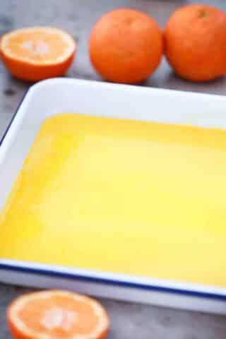 orange syrup in a baking sheet