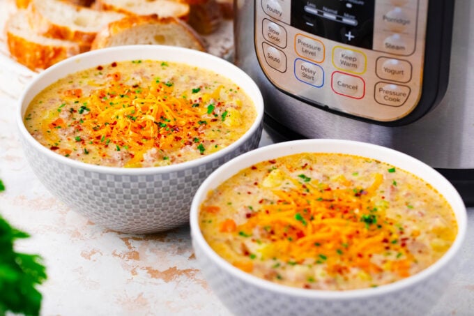 Two bowls of Instant Pot cheeseburger soup.