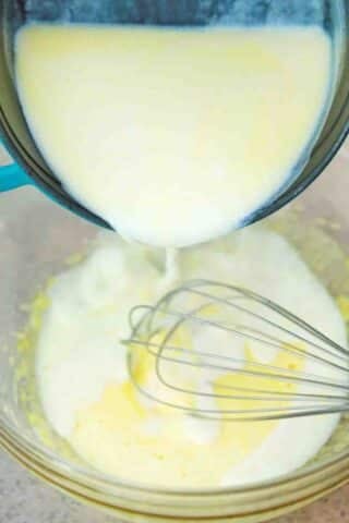 adding cream to eggs
