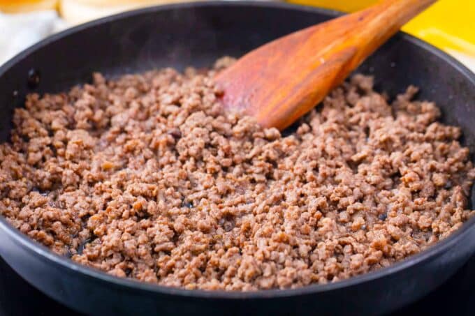Cooking ground beef in a skillet.